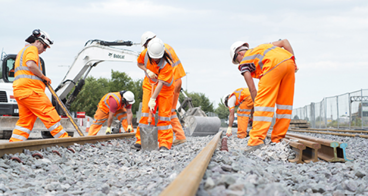 Women and men railways workers